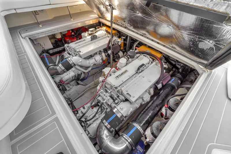  Yacht Photos Pics Engine compartment of a 1997 Sea Ray 400 Sundancer, showcasing dual Caterpillar engines.