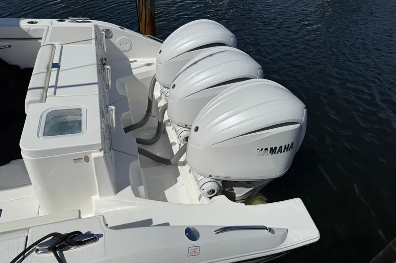 Centra Yacht Photos Pics 2023 Pursuit OS 355 Offshore boat with triple Yamaha outboard engines.