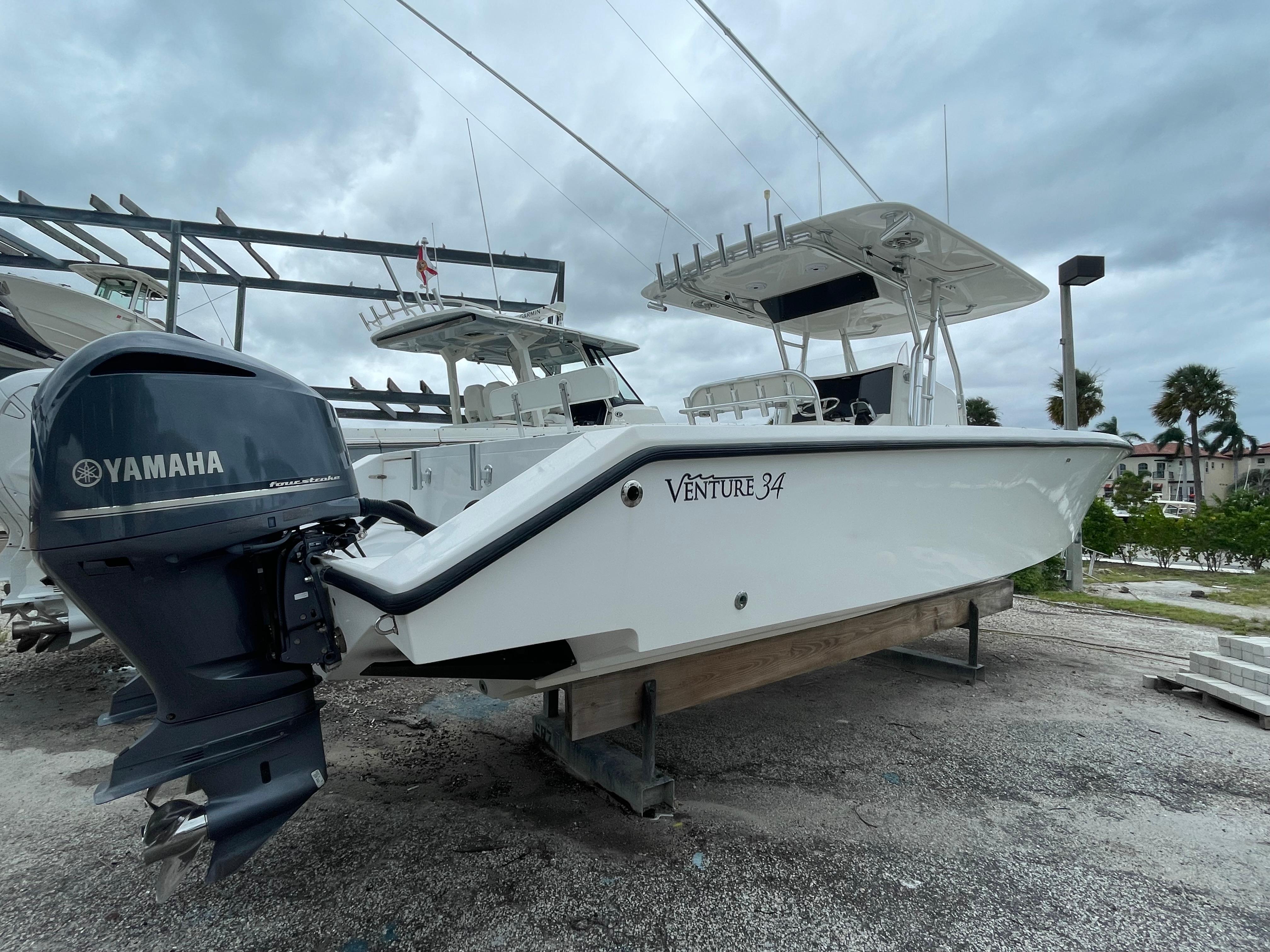 2000 Venture 34 Tournament boat with Yamaha engine on display.