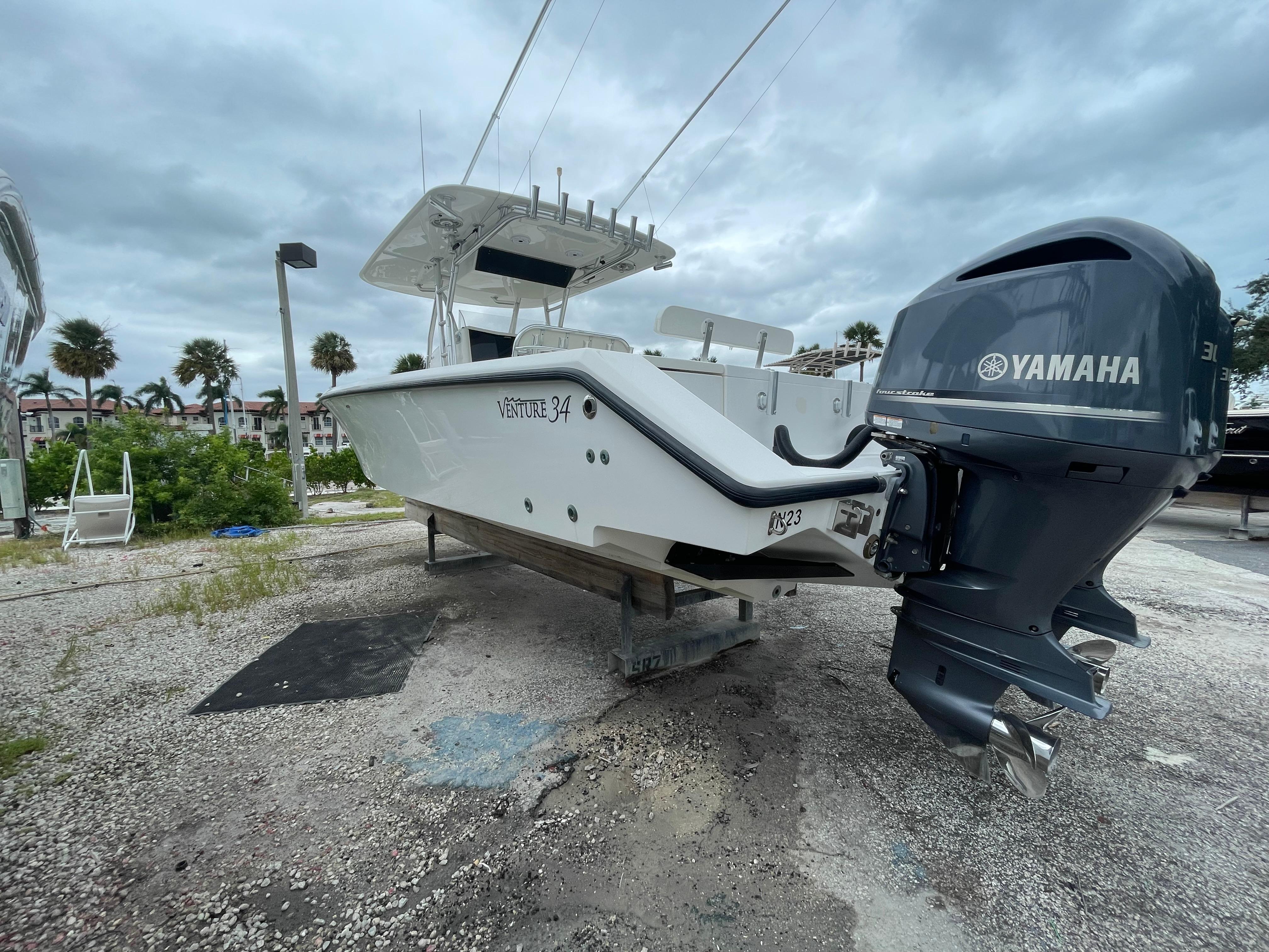 2000 Venture 34 Tournament boat with Yamaha engine on dry dock.