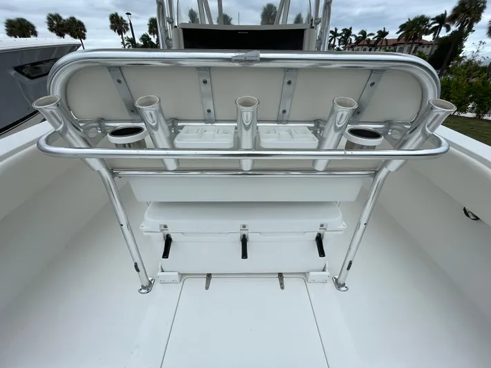  Yacht Photos Pics Venture 34 Tournament 2000 boat with rod holders and storage, sleek design.