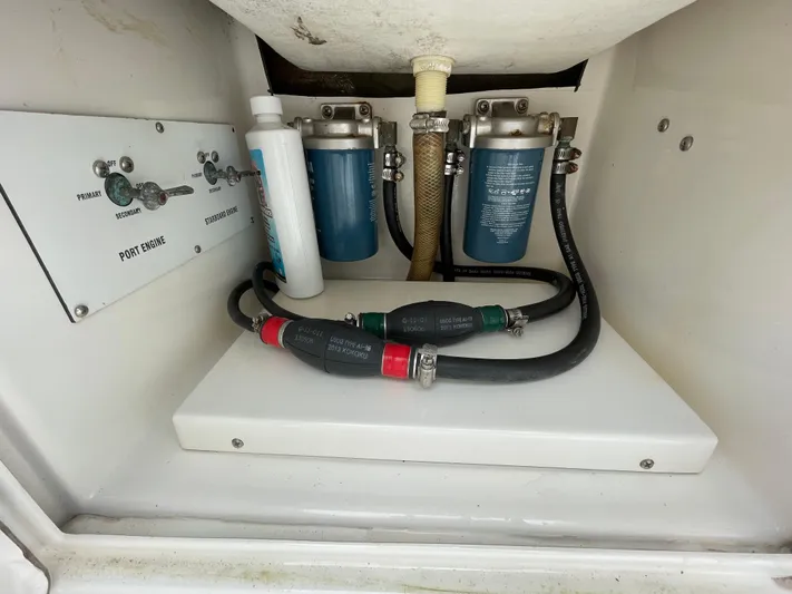  Yacht Photos Pics Venture 34 Tournament 2000 boat engine compartment with filters and hoses.