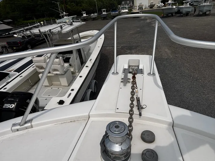 Martuni Yacht Photos Pics Bow view of 2002 Luhrs 40 Open boat with anchor chain and winch.