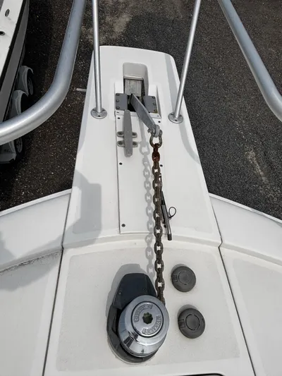 Martuni Yacht Photos Pics Bow of a 2002 Luhrs 40 Open boat with anchor chain and windlass.