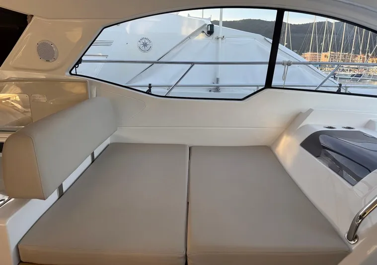  Yacht Photos Pics Interior seating of 2019 Azimut Atlantis 45 yacht with window view.