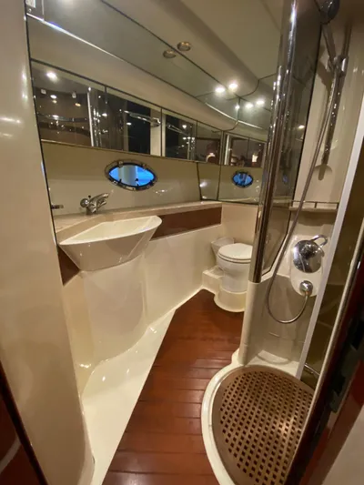  Yacht Photos Pics 2001 Fairline Squadron 55 yacht bathroom with modern fixtures and wooden flooring.