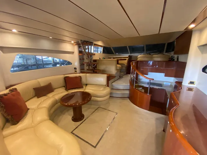  Yacht Photos Pics Luxurious interior of 2001 Fairline Squadron 55 yacht with elegant seating and modern design.