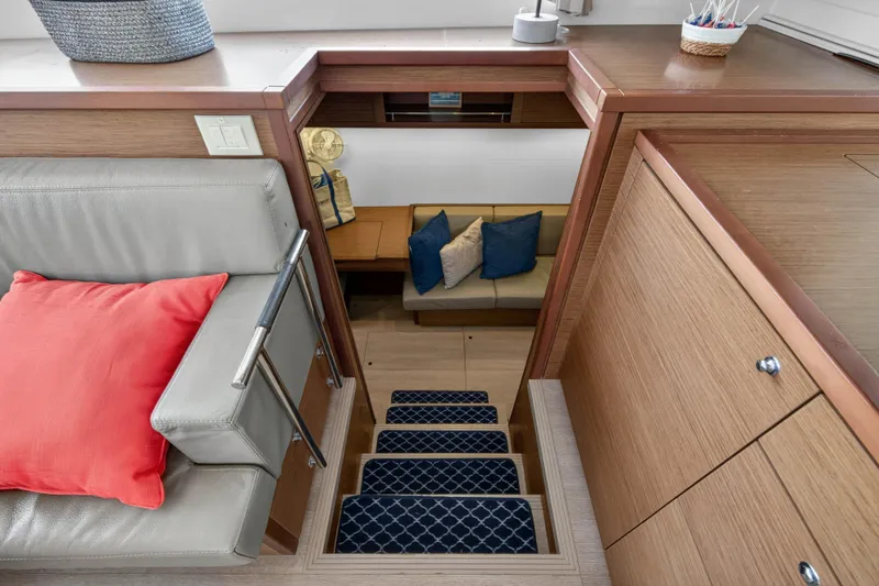  Yacht Photos Pics Interior of 2019 Lagoon 450 F yacht with stairs and seating area.
