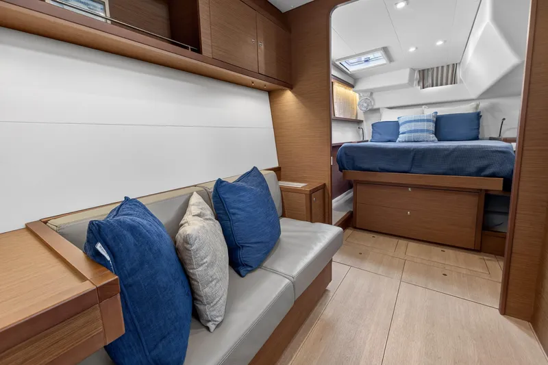  Yacht Photos Pics Luxurious interior of 2019 Lagoon 450 F yacht with cozy seating and elegant bedroom.