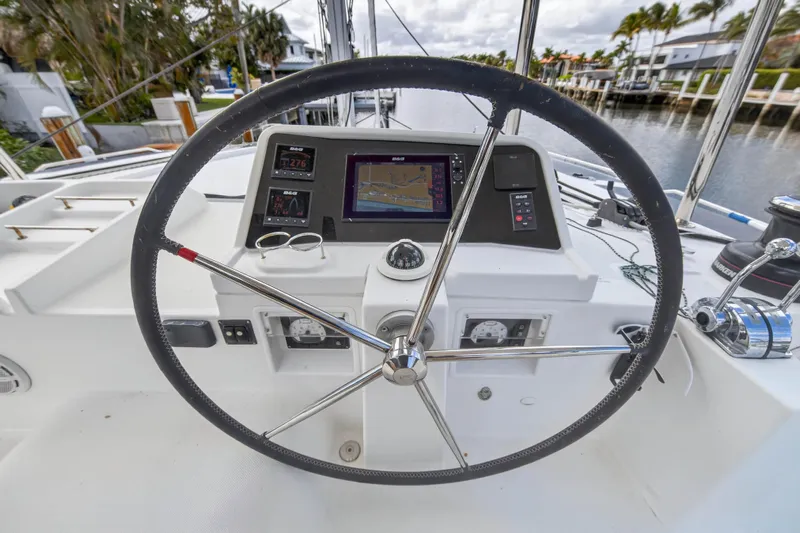  Yacht Photos Pics Steering wheel and navigation system of 2019 Lagoon 450 F catamaran.