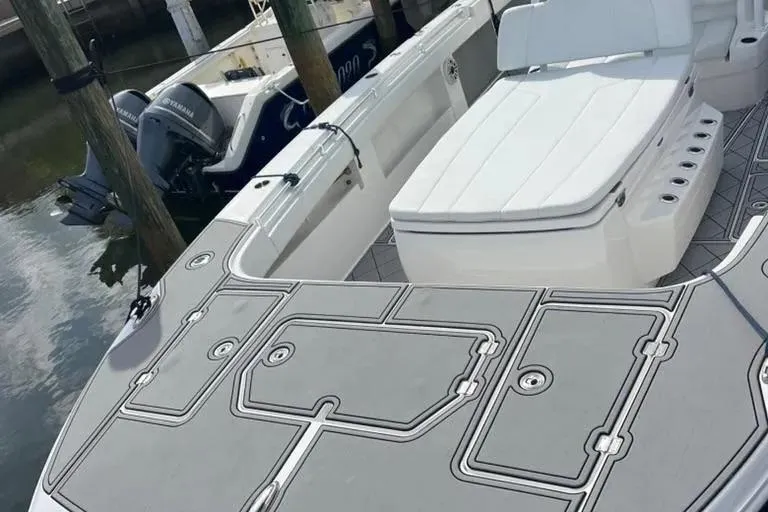  Yacht Photos Pics 2020 Invincible 40 Catamaran with sleek deck design and comfortable seating.