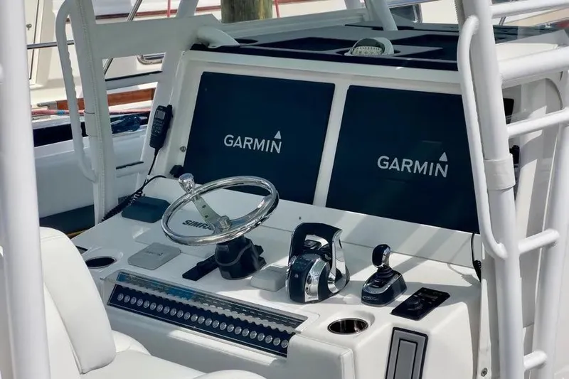  Yacht Photos Pics Control panel of 2020 Invincible 40 Catamaran with Garmin navigation displays.