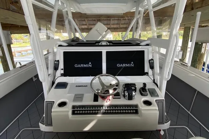  Yacht Photos Pics Helm of 2020 Invincible 40 Catamaran with dual Garmin displays and Simrad controls.