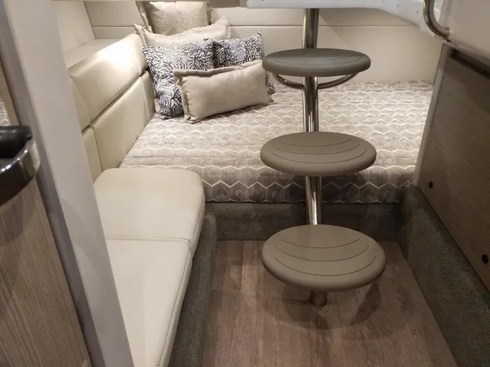  Yacht Photos Pics Interior cabin of a 2021 Formula 350 Crossover Bowrider with modern seating and bedding.