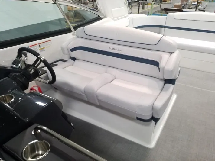  Yacht Photos Pics 2021 Formula 350 Crossover Bowrider interior with white and blue seating.