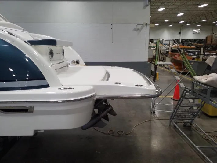  Yacht Photos Pics 2021 Formula 350 Crossover Bowrider in a warehouse, rear view.