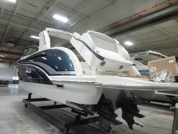  Yacht Photos Pics 2021 Formula 350 Crossover Bowrider in a warehouse, rear view.