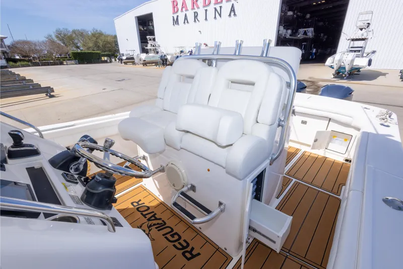 Change Order Yacht Photos Pics 2018 Regulator 31 boat interior with white seating at Barber Marina.