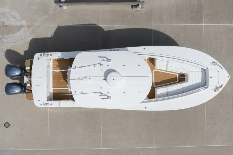 Change Order Yacht Photos Pics Overhead view of 2018 Regulator 31 boat with dual engines and spacious deck.