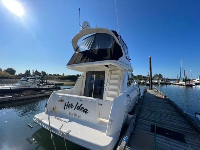 Her Idea Yacht Photos Pics 2005 Meridian 381 yacht docked at marina under clear blue sky.
