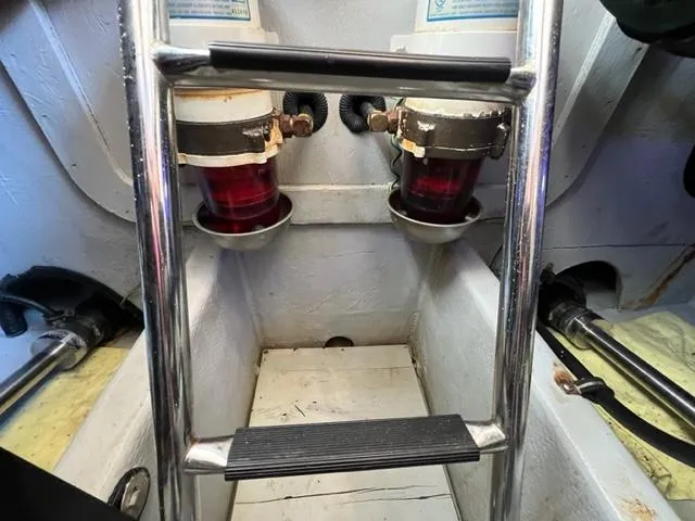 Her Idea Yacht Photos Pics Engine room of a 2005 Meridian 381 yacht with fuel filters and ladder.