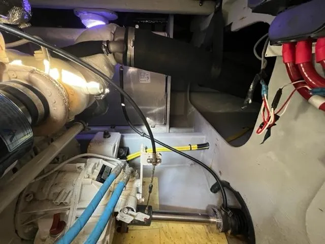 Her Idea Yacht Photos Pics Engine compartment of a 2005 Meridian 381 boat with visible mechanical components.