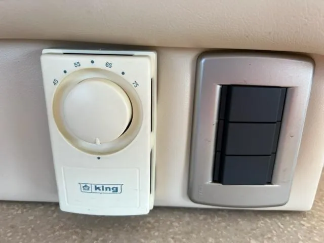 Her Idea Yacht Photos Pics Thermostat and control panel in a 2005 Meridian 381 yacht.