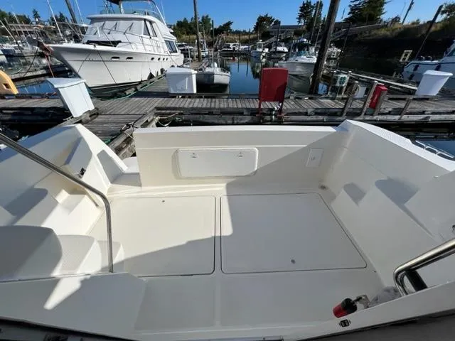 Her Idea Yacht Photos Pics 2005 Meridian 381 boat deck at marina with other yachts.