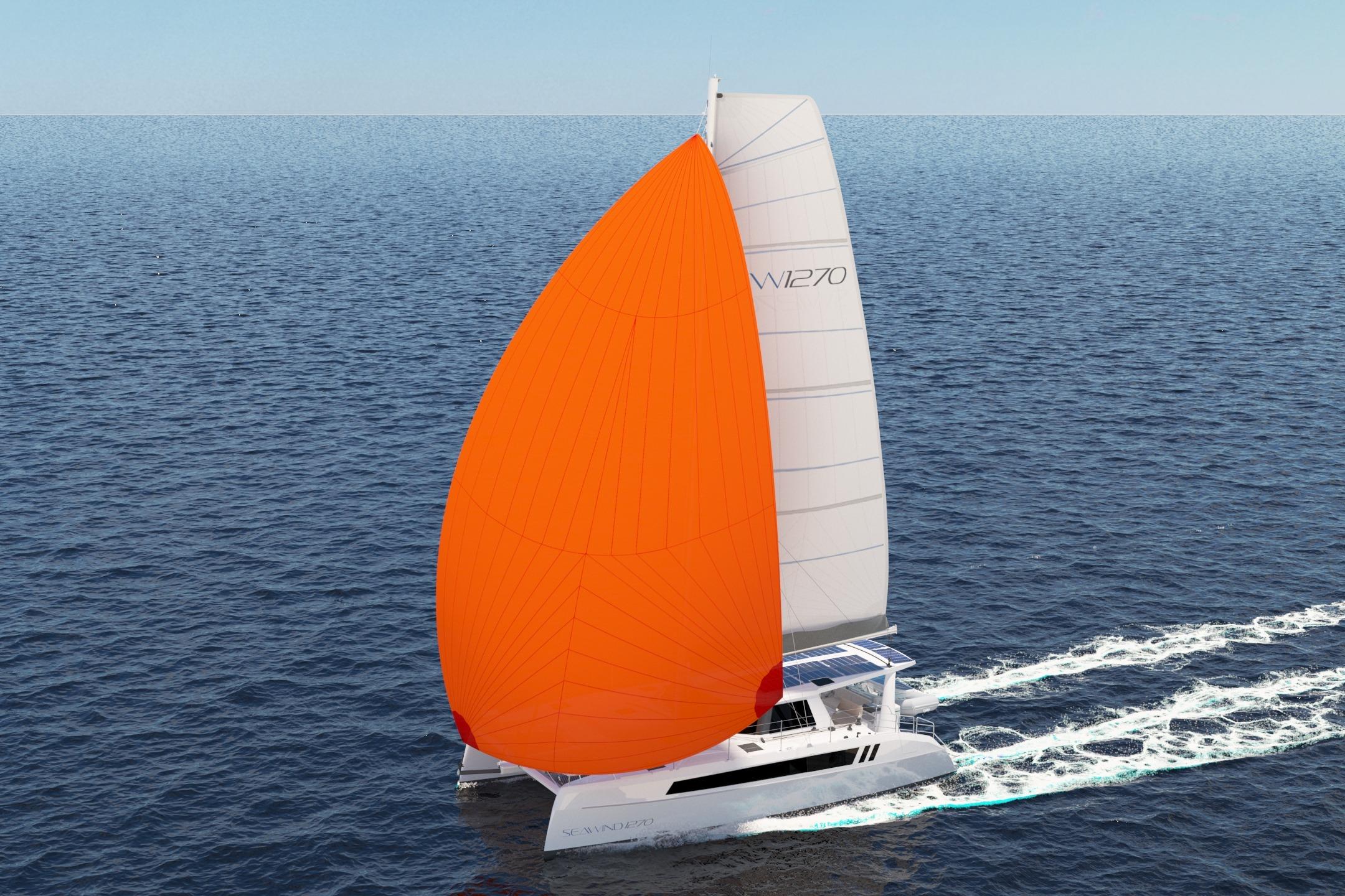 2026 Seawind 1270 catamaran sailing with vibrant orange spinnaker on open sea.