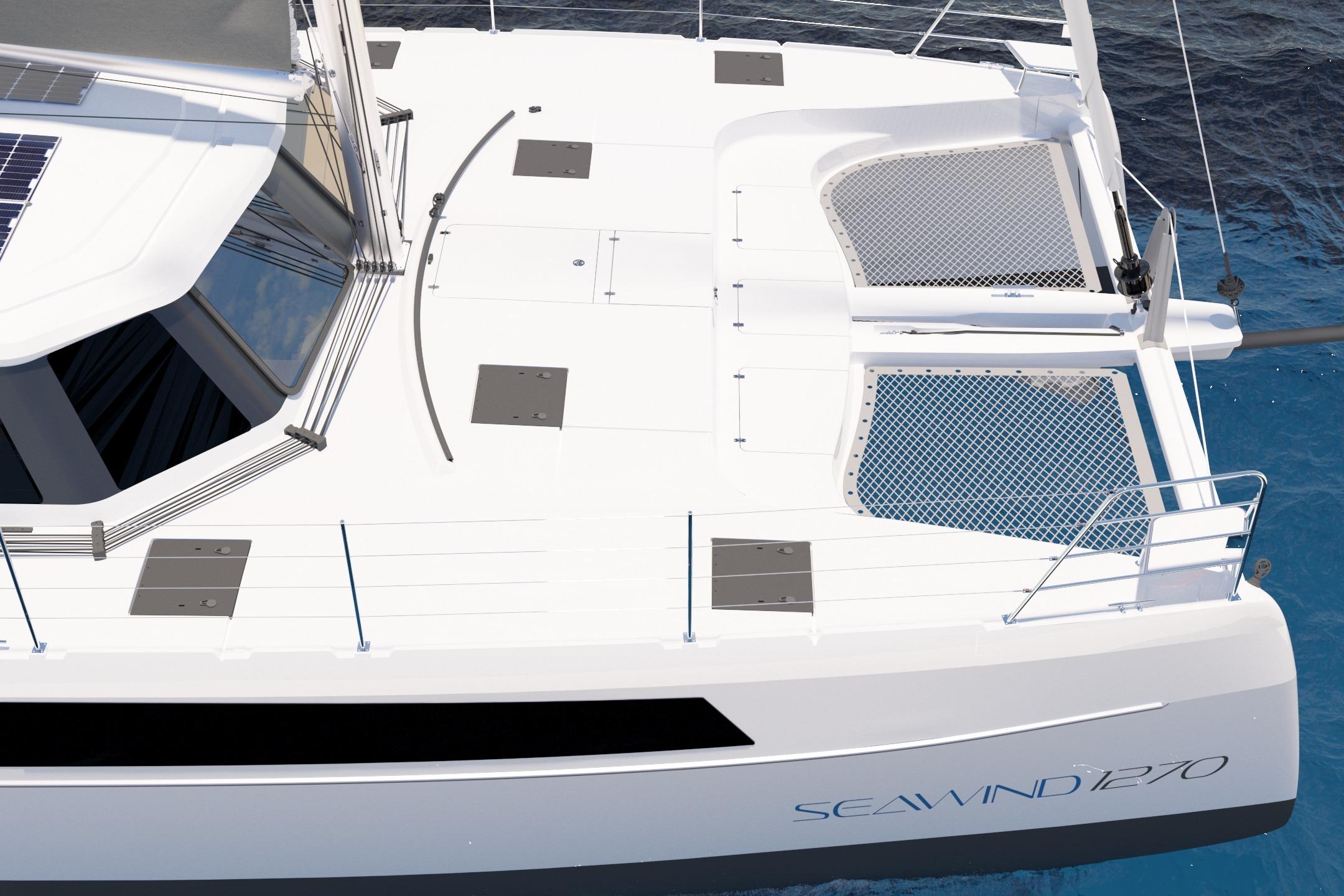 2026 Seawind 1270 catamaran deck with netting over blue ocean water.