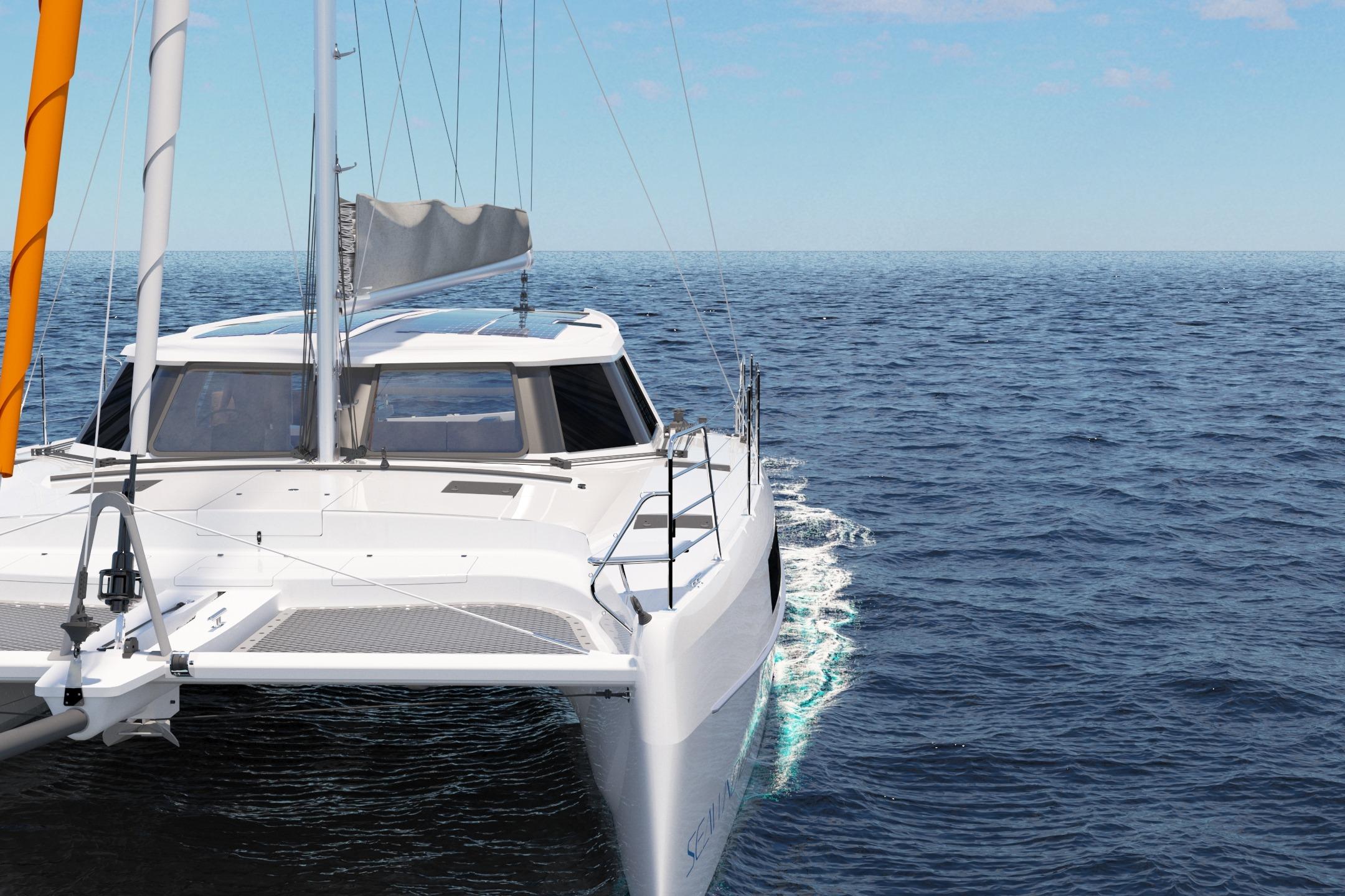 2026 Seawind 1270 catamaran sailing on open ocean under clear blue sky.
