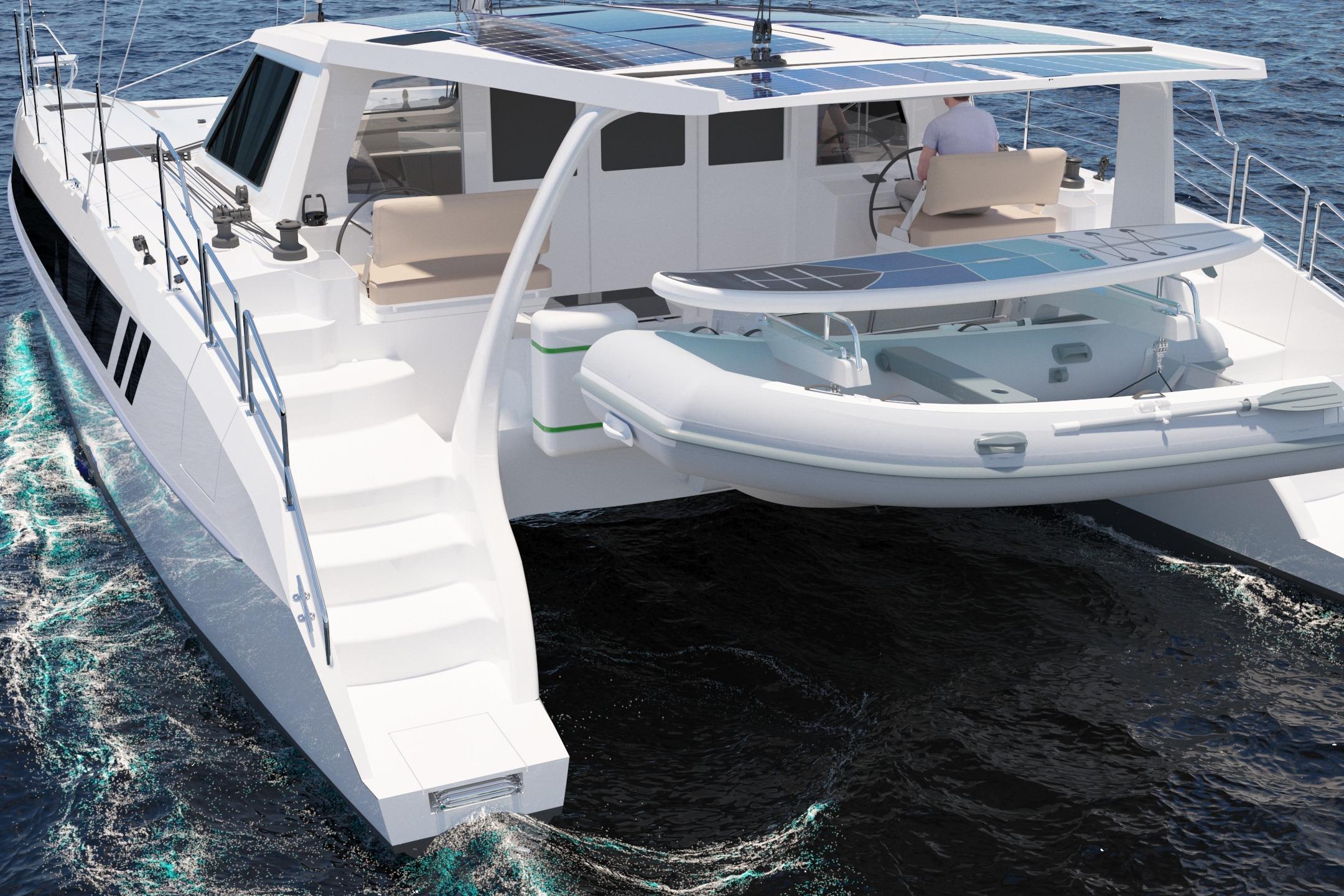 2026 Seawind 1270 catamaran sailing on open water, featuring solar panels and a dinghy.