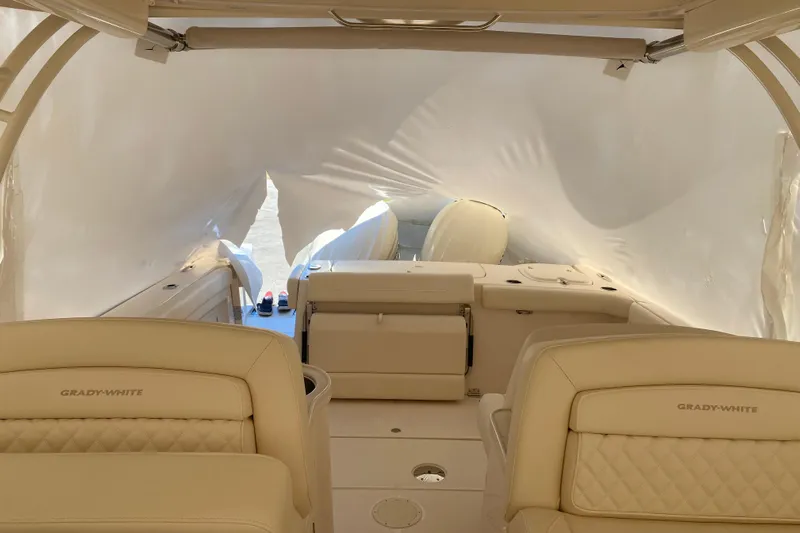  Yacht Photos Pics 2026 Grady-White Freedom 307 boat interior with protective covering.