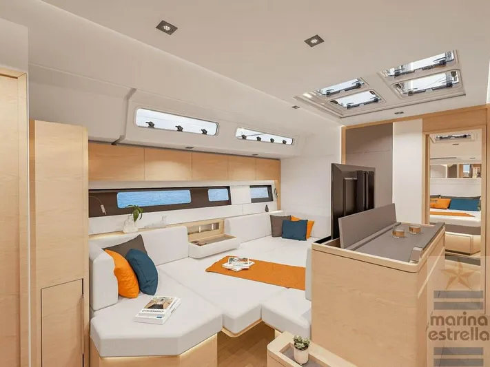 Yacht Photos Pics Luxurious interior of 2022 Hanse 510 yacht with modern furnishings and natural light.