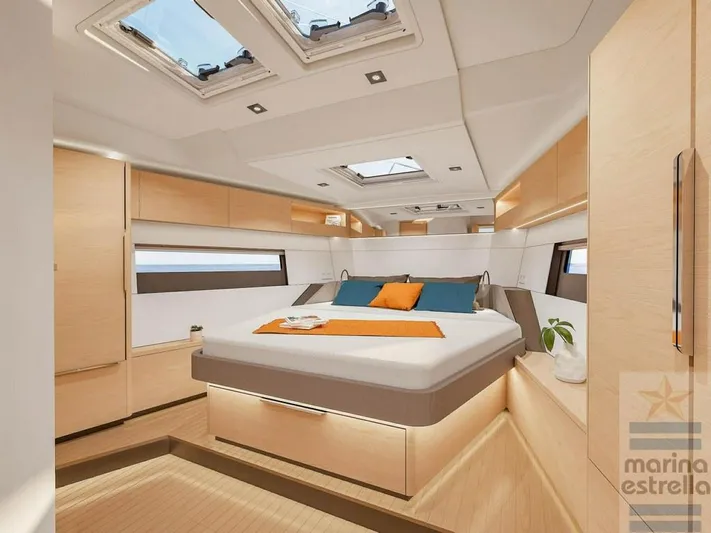  Yacht Photos Pics Luxurious interior of 2022 Hanse 510 yacht with modern design and skylights.