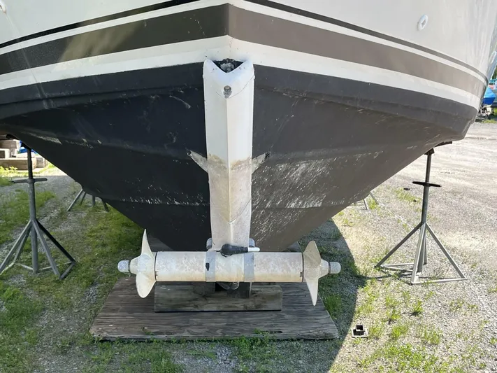  Yacht Photos Pics 1996 Carver 370 Aft Cabin boat hull on stands, showing propeller and rudder.