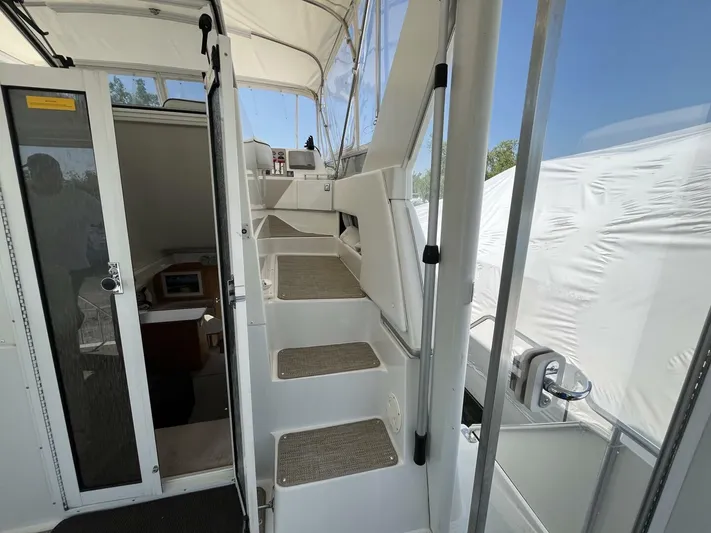  Yacht Photos Pics 1996 Carver 370 Aft Cabin interior with stairs and cabin entrance.