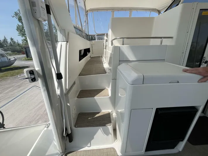  Yacht Photos Pics 1996 Carver 370 Aft Cabin interior with steps and seating area.