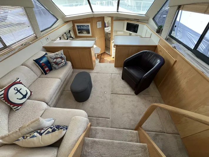  Yacht Photos Pics Interior of 1996 Carver 370 Aft Cabin with cozy seating and modern amenities.