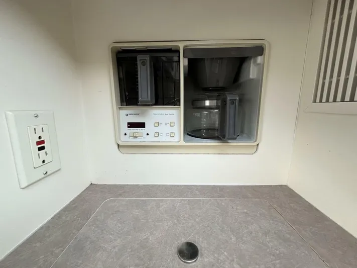  Yacht Photos Pics Built-in coffee maker in a 1996 Carver 370 Aft Cabin yacht kitchen.