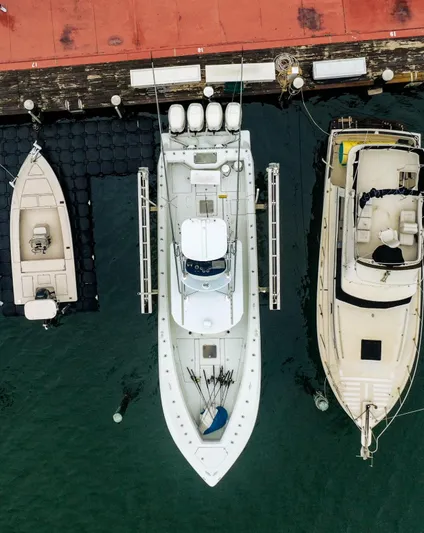  Yacht Photos Pics Aerial view of a 2017 SeaVee Z 39 boat docked between two other boats.