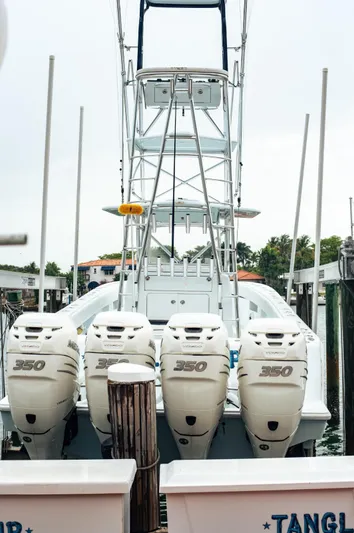  Yacht Photos Pics 2017 SeaVee Z 39 boat with four powerful 350 horsepower engines docked at a marina.