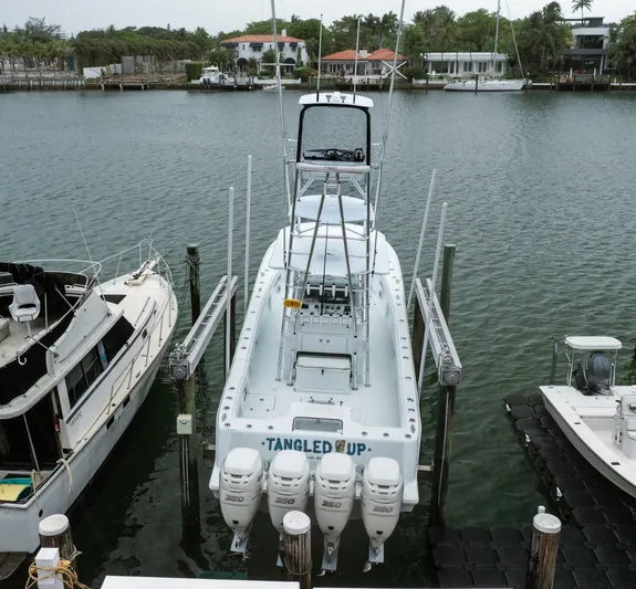  Yacht Photos Pics 2017 SeaVee Z 39 boat docked with four engines, labeled "Tangled Up."