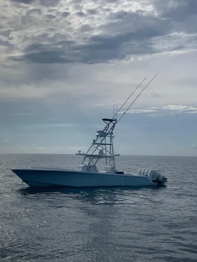  Yacht Photos Pics 2017 SeaVee Z 39 boat on calm ocean under cloudy sky.