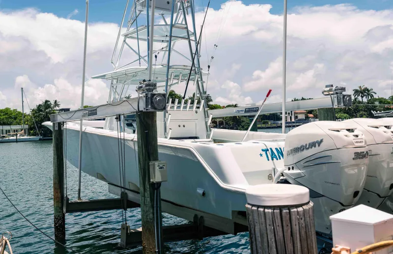  Yacht Photos Pics 2017 SeaVee Z 39 boat docked with twin Mercury engines, under a partly cloudy sky.