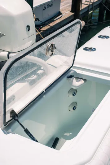  Yacht Photos Pics 2017 SeaVee Z 39 boat with open storage compartment, showcasing sleek design and functionality.