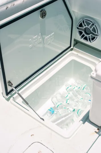  Yacht Photos Pics Open storage compartment on 2017 SeaVee Z 39 boat with water bottles inside.