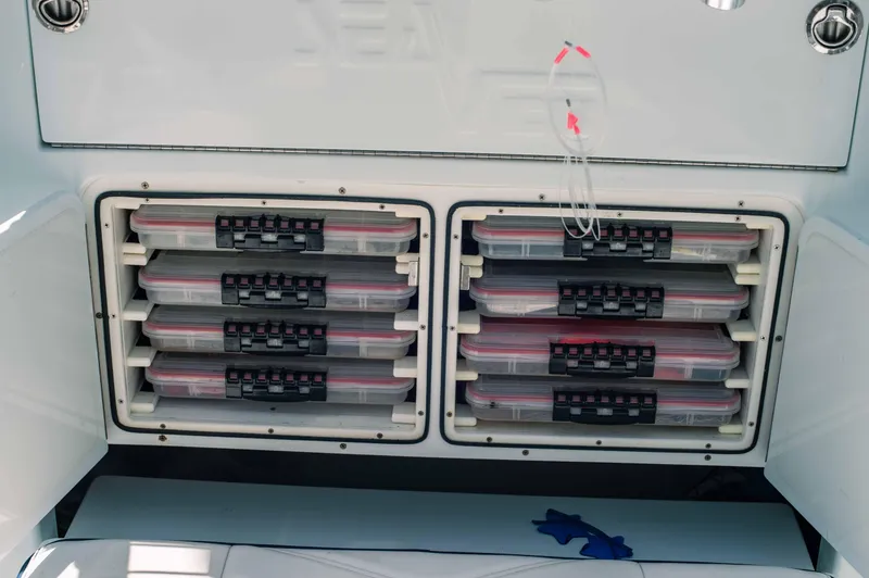  Yacht Photos Pics Storage compartments on a 2017 SeaVee Z 39 boat, featuring organized tackle boxes.