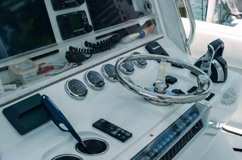  Yacht Photos Pics 2017 SeaVee Z 39 boat dashboard with steering wheel and control gauges.