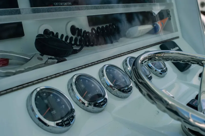  Yacht Photos Pics Dashboard of 2017 SeaVee Z 39 boat with gauges and steering wheel.